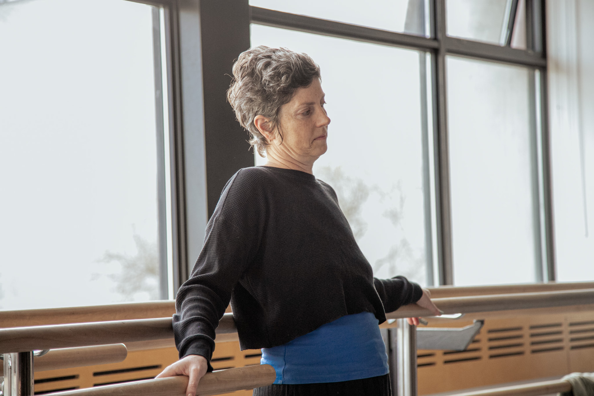 At the window — waiting for the next round