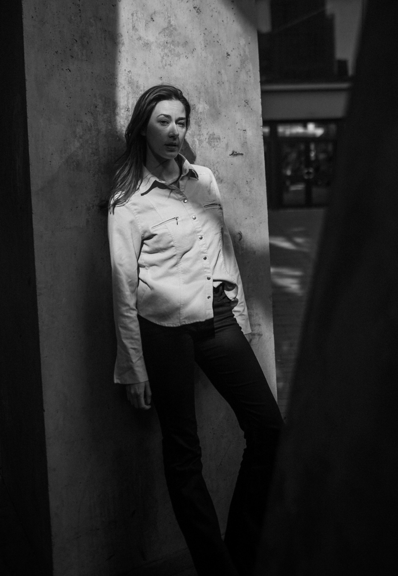 Concrete column — deep shadow portrait at night