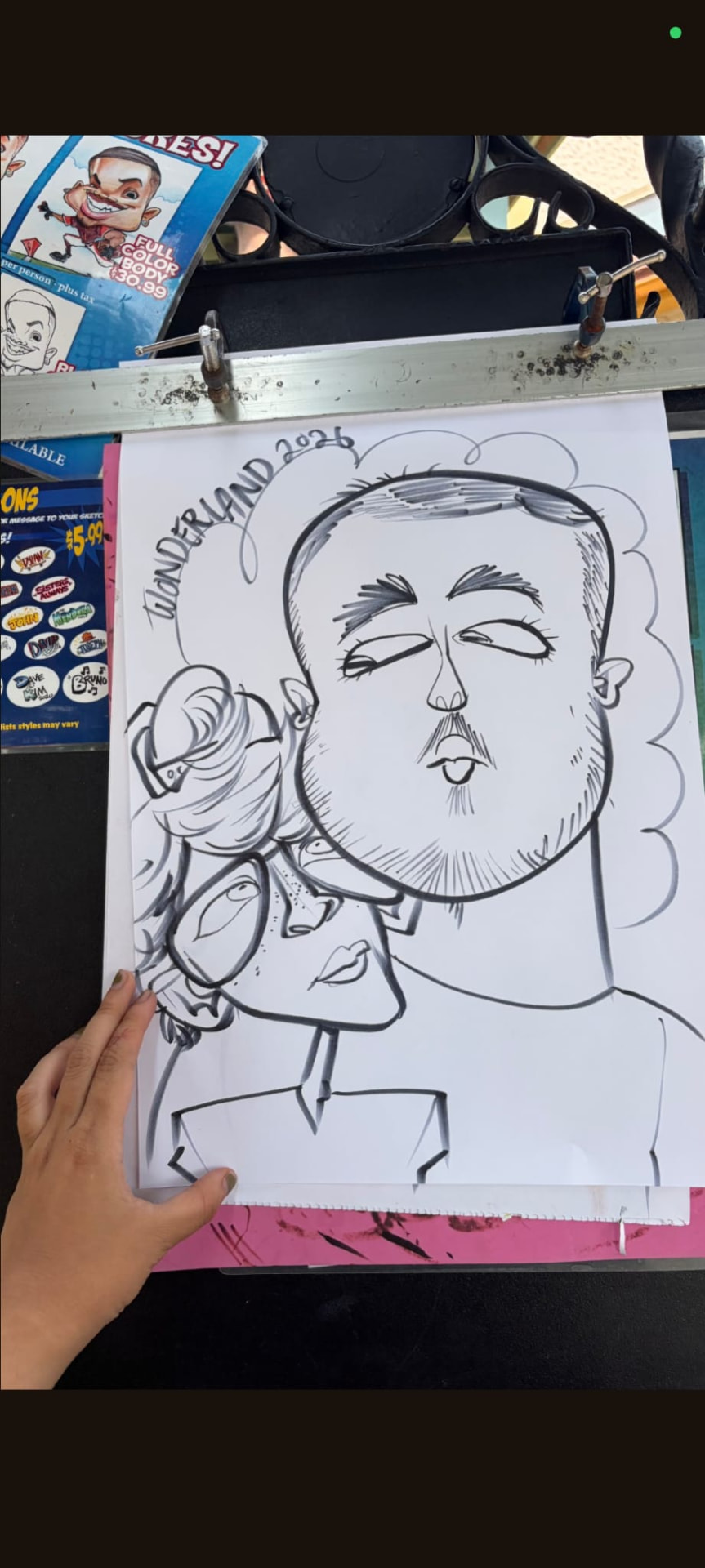 Black and white couple caricature drawn at Canada's Wonderland