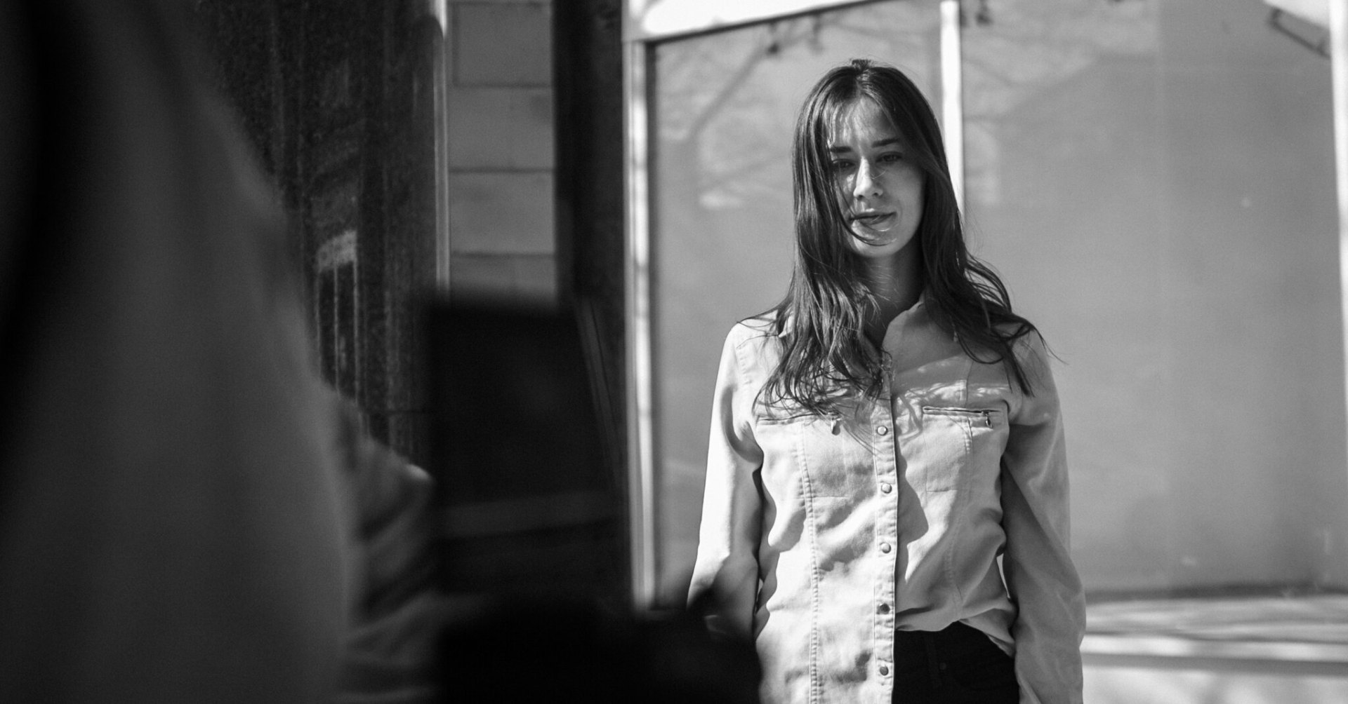 Doorway light — sunlit street portrait