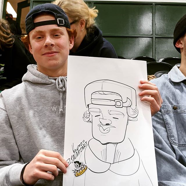 Happy guest with their live caricature
