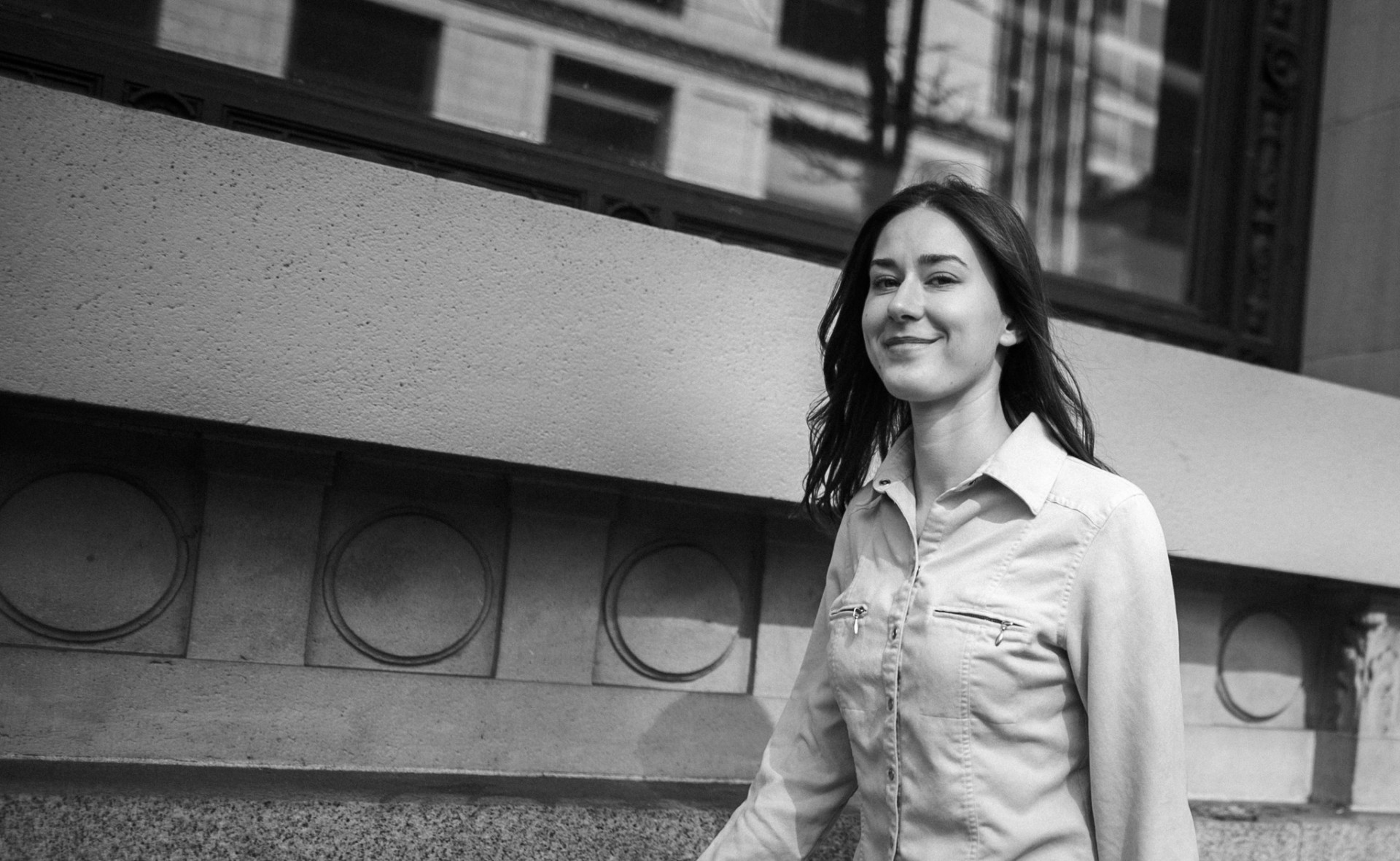 Heritage stonework — walking portrait downtown