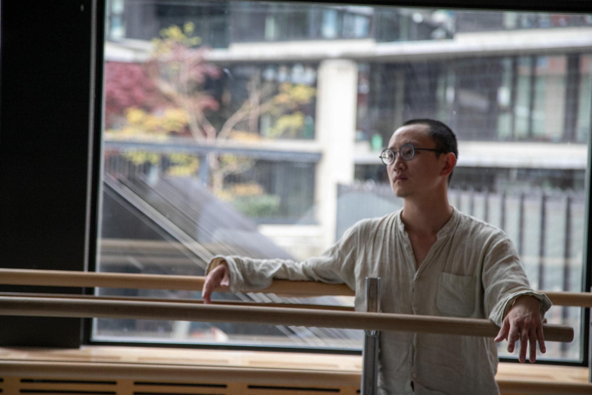 Portrait at the barre — natural window light